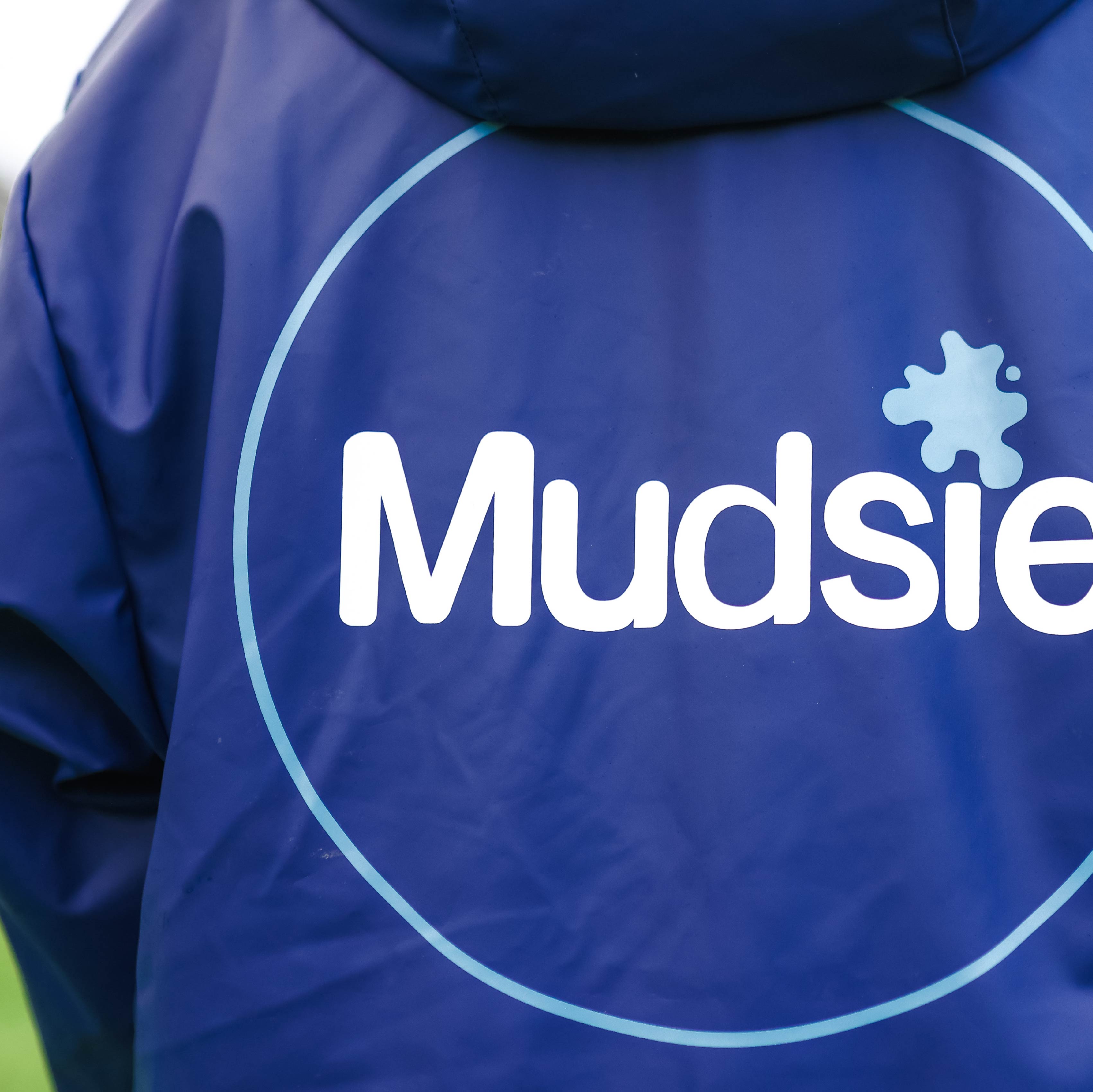 TEAL LOGO MUDSIE COAT